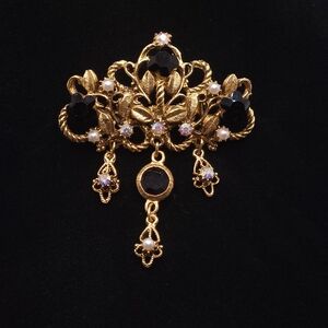 Vintage-Inspired Goldtone and Black Brooch